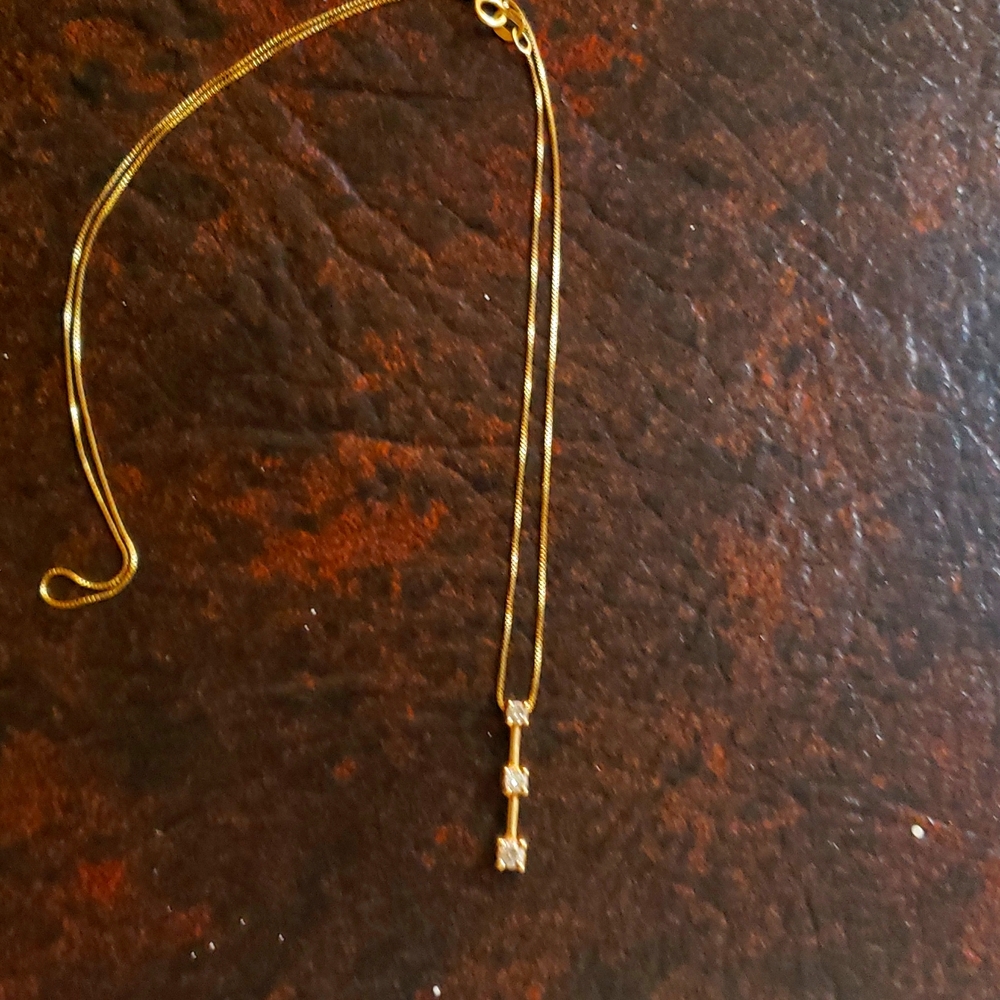 14k gold and diamond necklace.